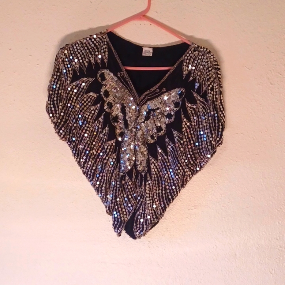 Sequin top. 100% silk.